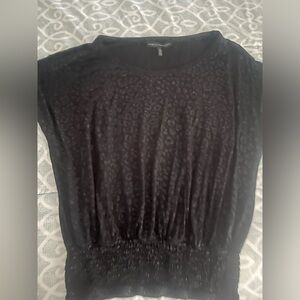 Very pretty black animal print blouse/soft shirt. Pull over stretch bottom